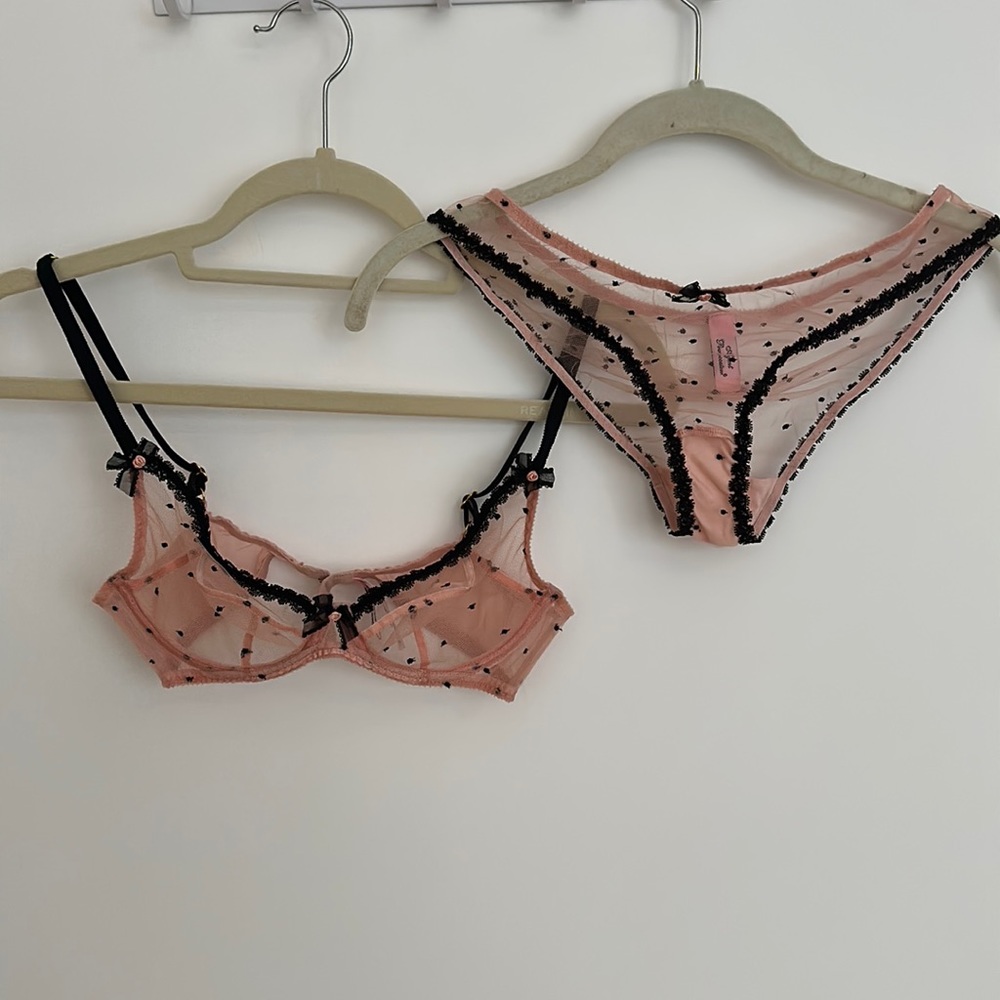Agent Provocateur matching pink and black lace set